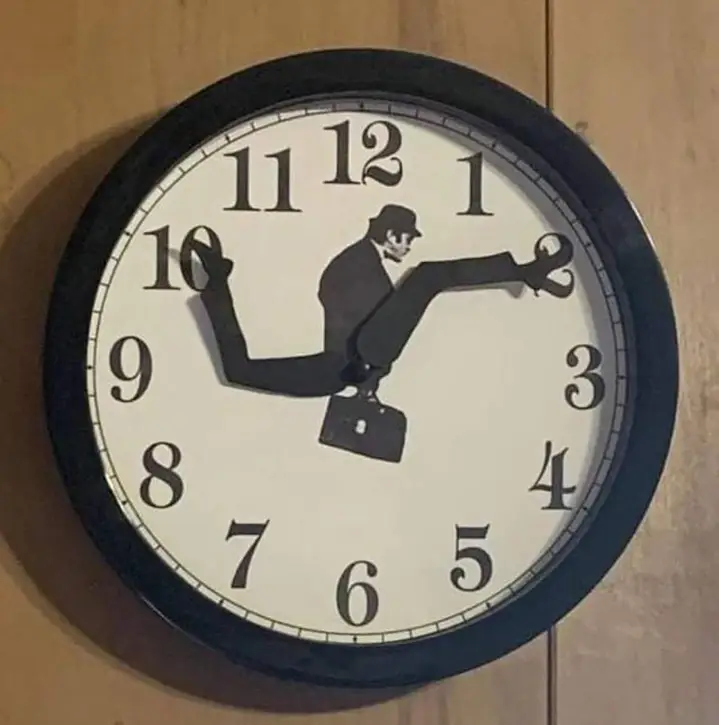 Horloge homme qui court.